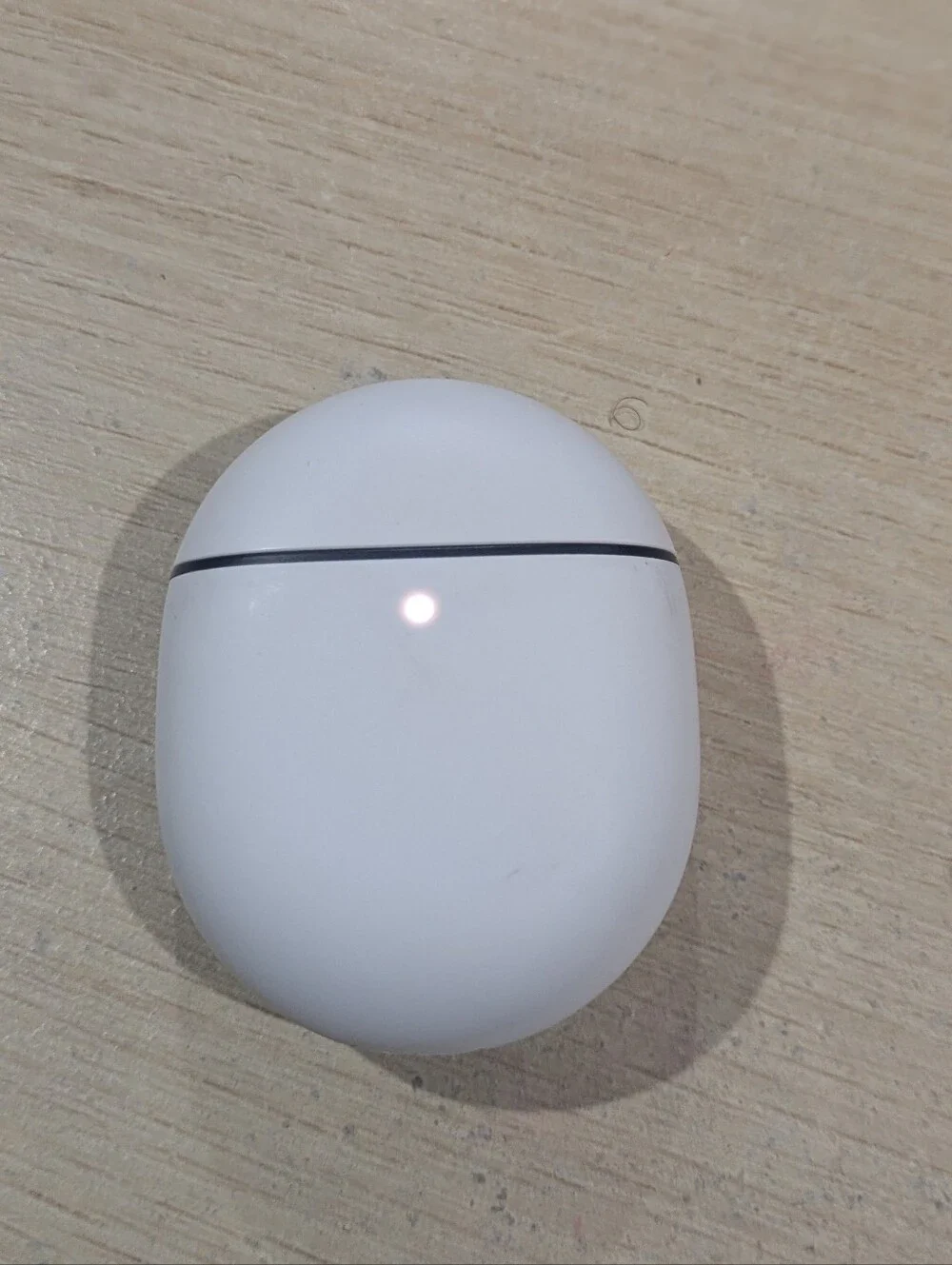 google True Wireless Earbuds with White Charging Case and Gray Earbuds